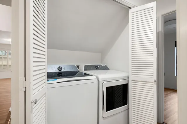a utility room with dryer and washer
