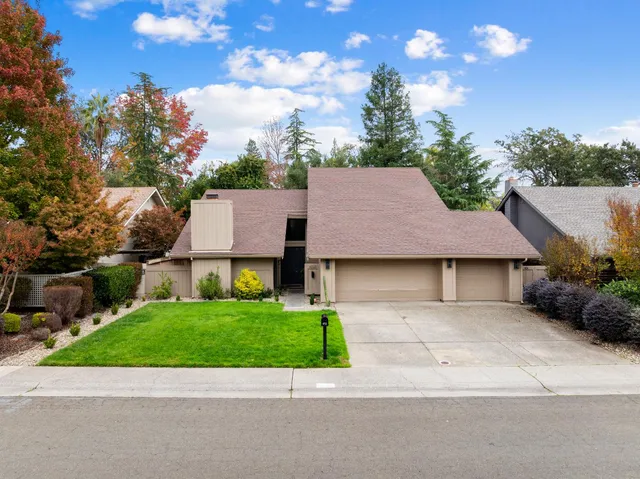 a house view with a garden space