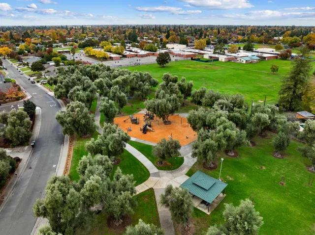 an aerial view of a house with a garden