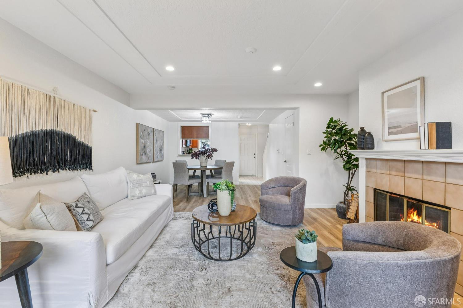 36931 Newark Boulevard, Unit E Newark, CA 94560 - Photo 13 of 37 a living room with furniture and a fireplace