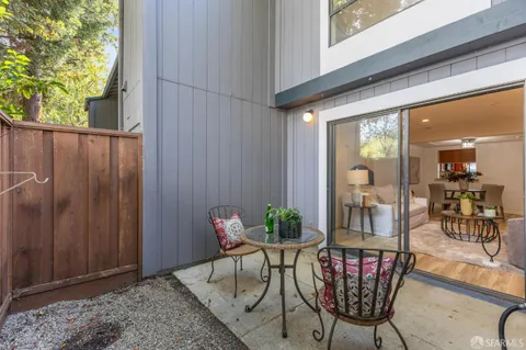 a view of an outdoor space with furniture