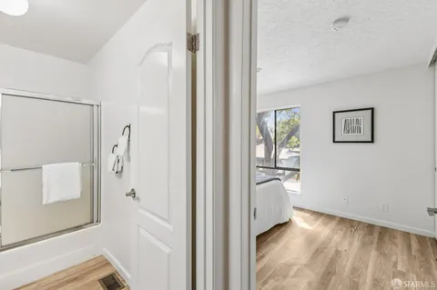 a view of entryway with wooden floor