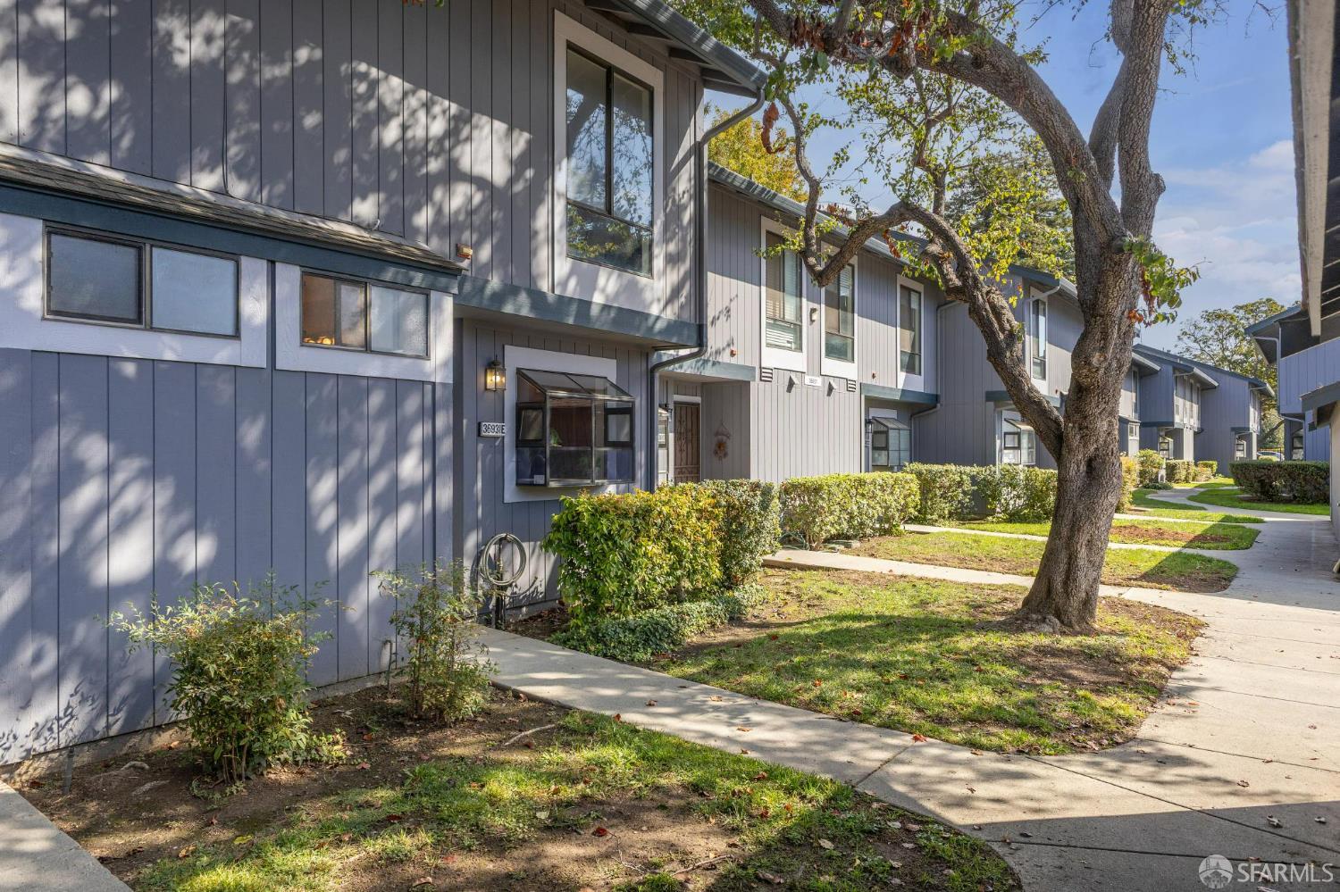 36931 Newark Boulevard, Unit E Newark, CA 94560 - Photo 37 of 37 a view of a house with a yard