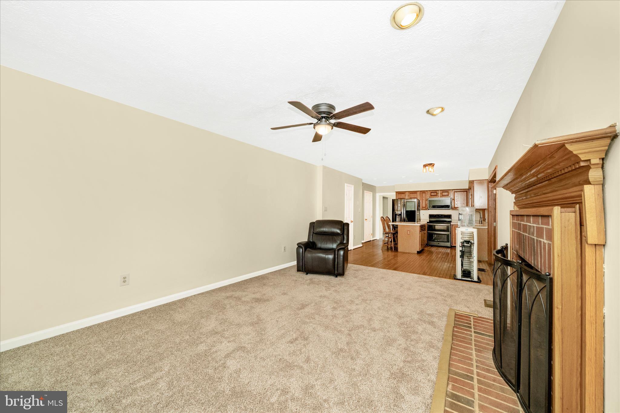 9534 Liberty Road Frederick, MD 21701 - Photo 24 of 70 a view of a livingroom with a ceiling fan