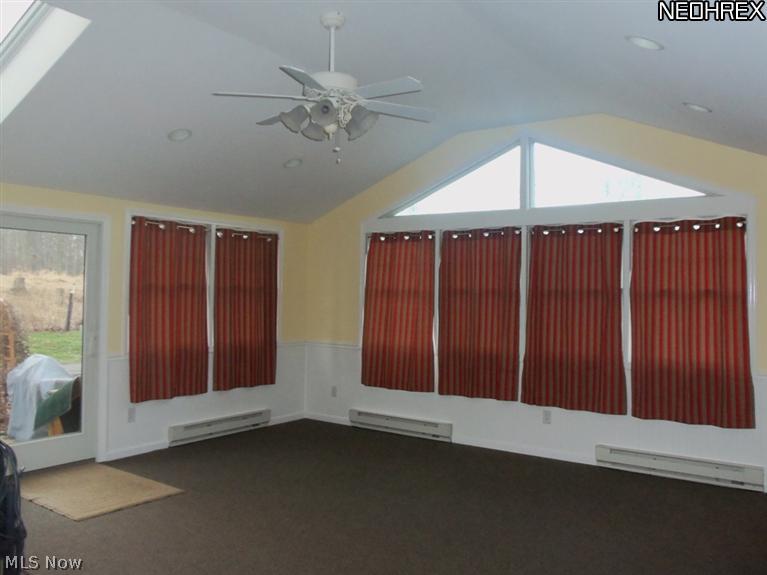 15640 Georgia Road Middlefield, OH 44062 - Photo 5 of 19 Family room with access to private rear patio