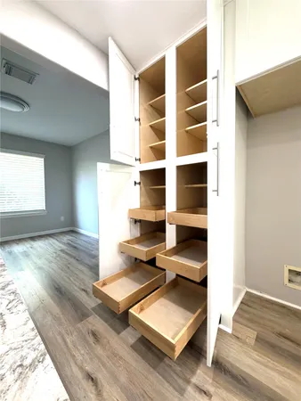 a view of workspace with wooden floor