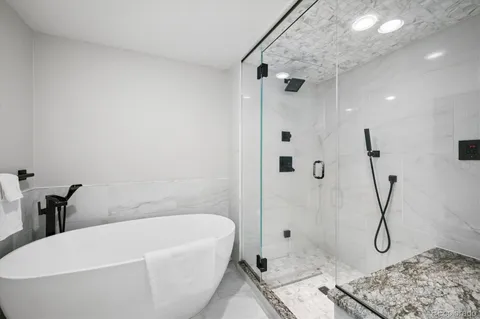 a bathroom with a sink and a shower