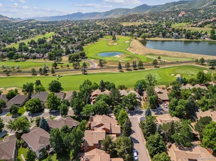 an aerial view of a city with lake view