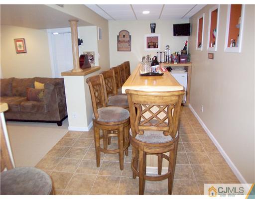 29 West Cliff Road Colonia, NJ 07067 - Photo 21 of 25 a living room with furniture and a table