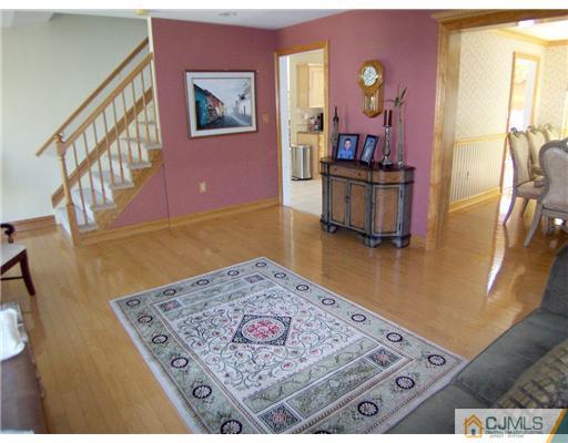 29 West Cliff Road Colonia, NJ 07067 - Photo 4 of 25 a view of a living room and dining room