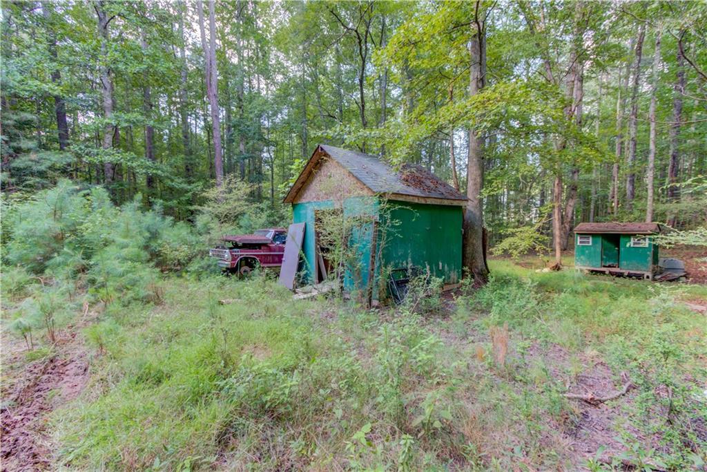 6350 Blackjack Road Flowery Branch, GA 30542 - Photo 6 of 17 a backyard of a house with seating space