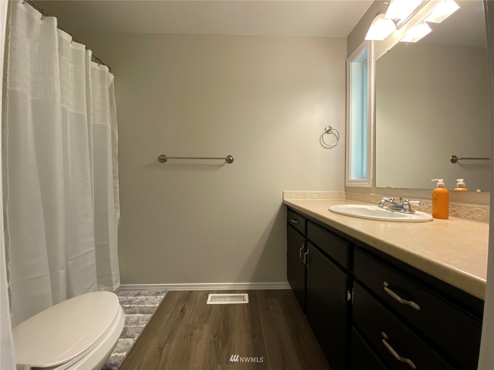 160 Galaxie Road Chehalis, WA 98532 - Photo 23 of 27 a bathroom with a granite countertop sink toilet and shower