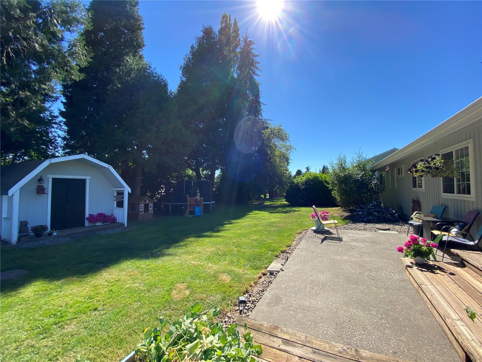 160 Galaxie Road Chehalis, WA 98532 - Photo 26 of 27 a view of a house with garden and sitting area