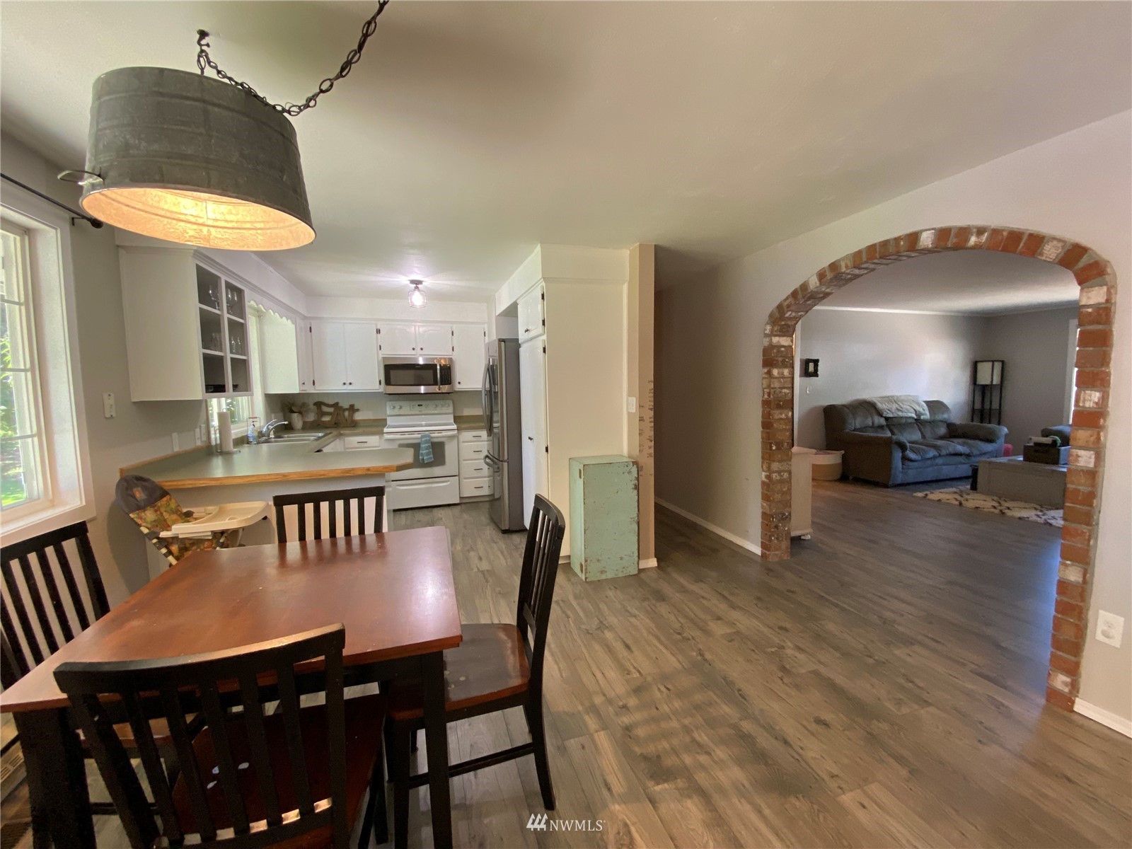 160 Galaxie Road Chehalis, WA 98532 - Photo 10 of 27 a view of a dining room with furniture and a chandelier