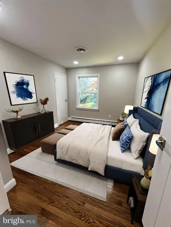 a bedroom with bed and window