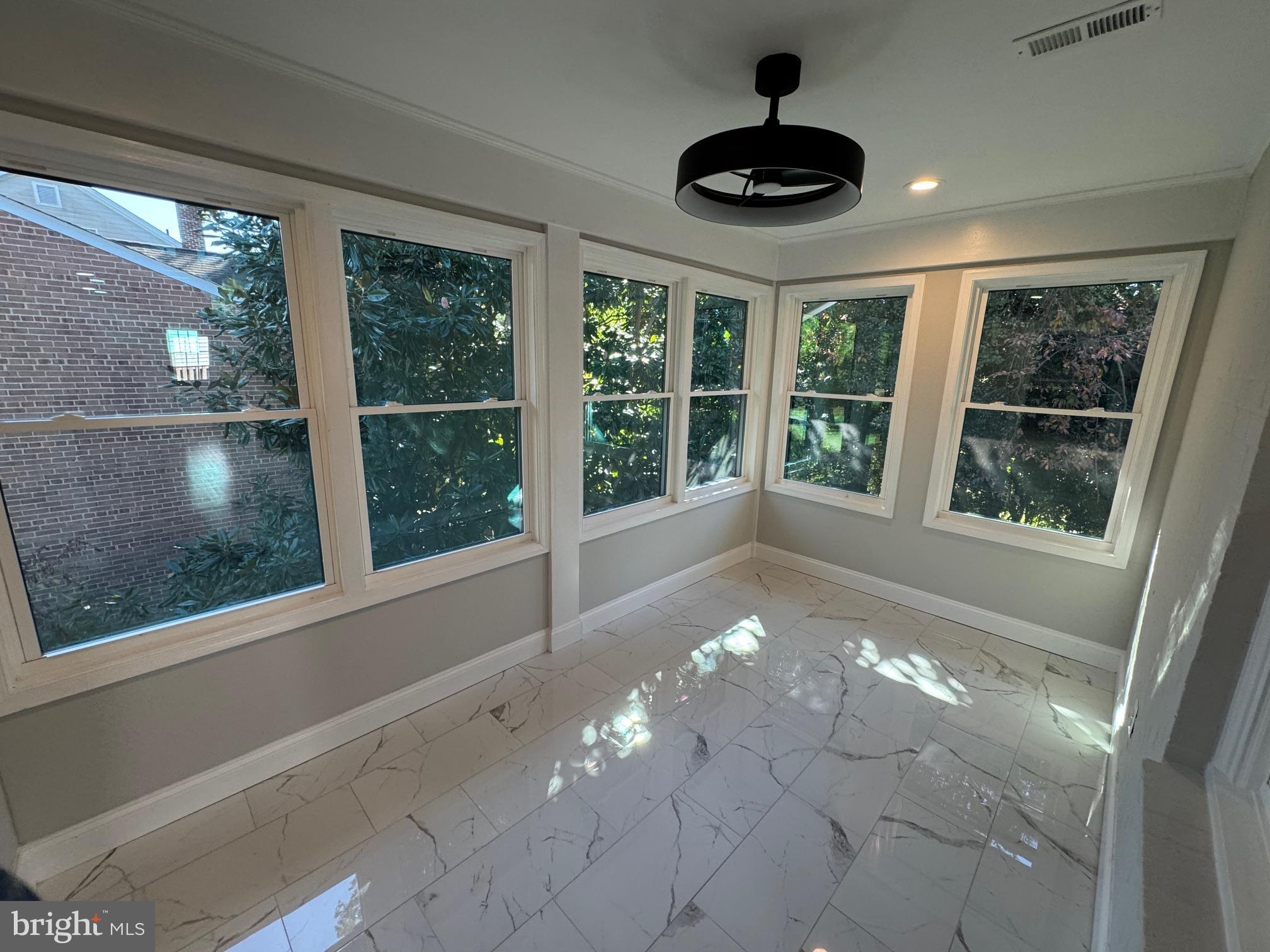 5612 Namakagan Road Bethesda, MD 20816 - Photo 26 of 34 a view of an empty room with a window