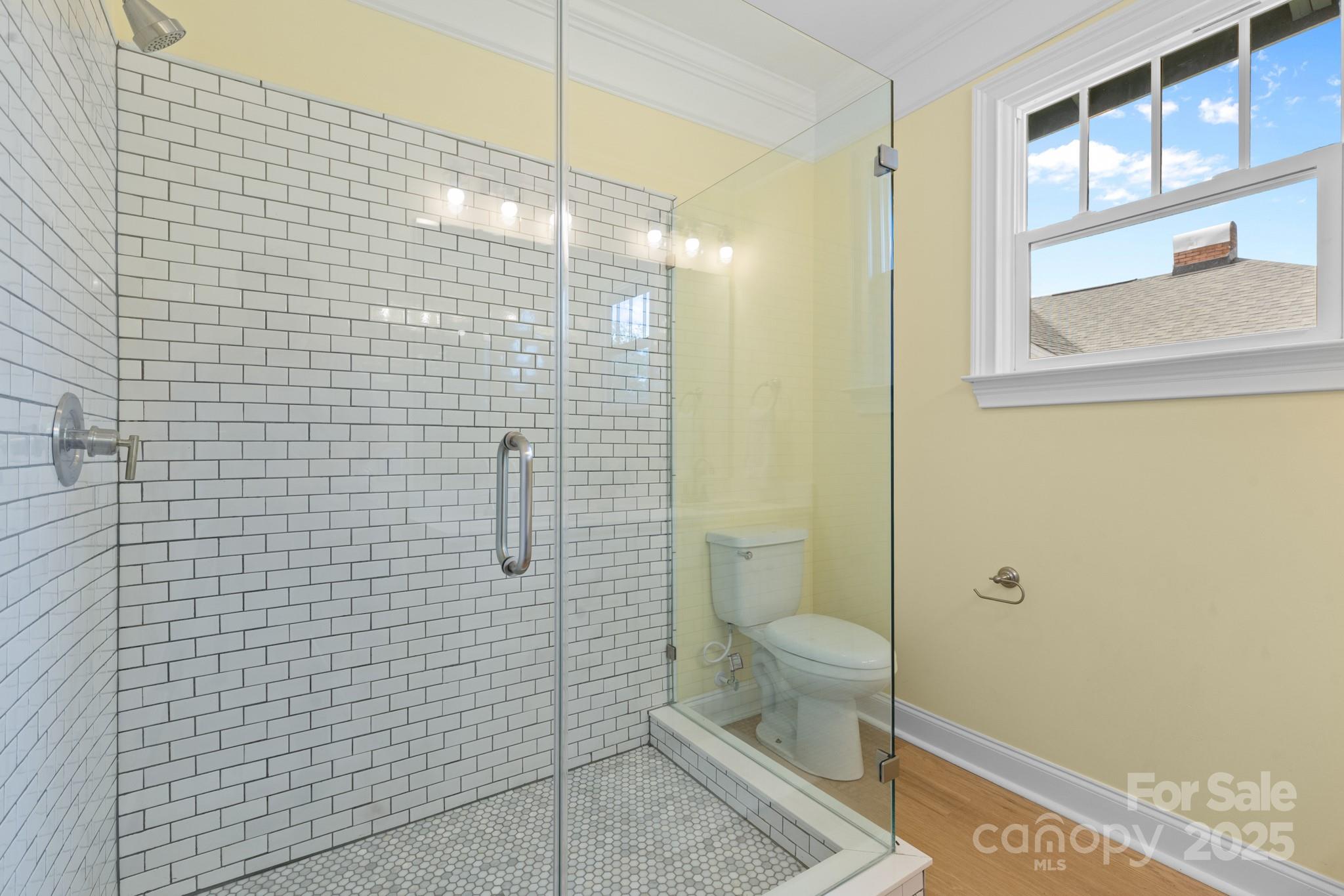 304 West Gay Street Lancaster, SC 29720 - Photo 14 of 28 a bathroom with a toilet and a shower