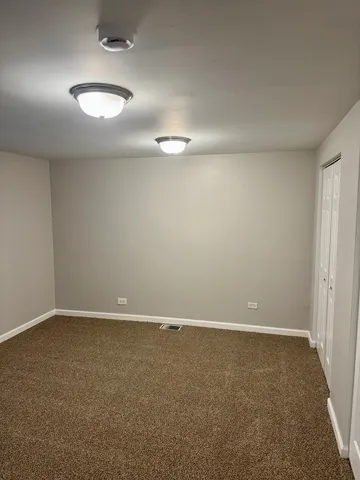 a view of a livingroom with a staircase