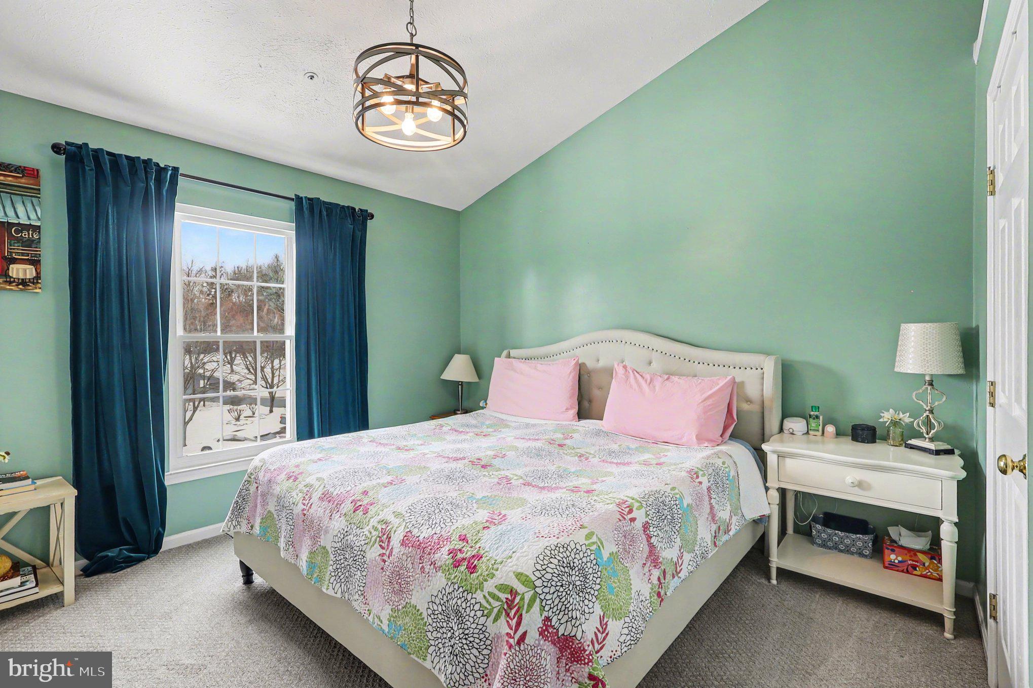 12607 Granite Ridge Drive North Potomac, MD 20878 - Photo 14 of 35 a bedroom with a bed and a window