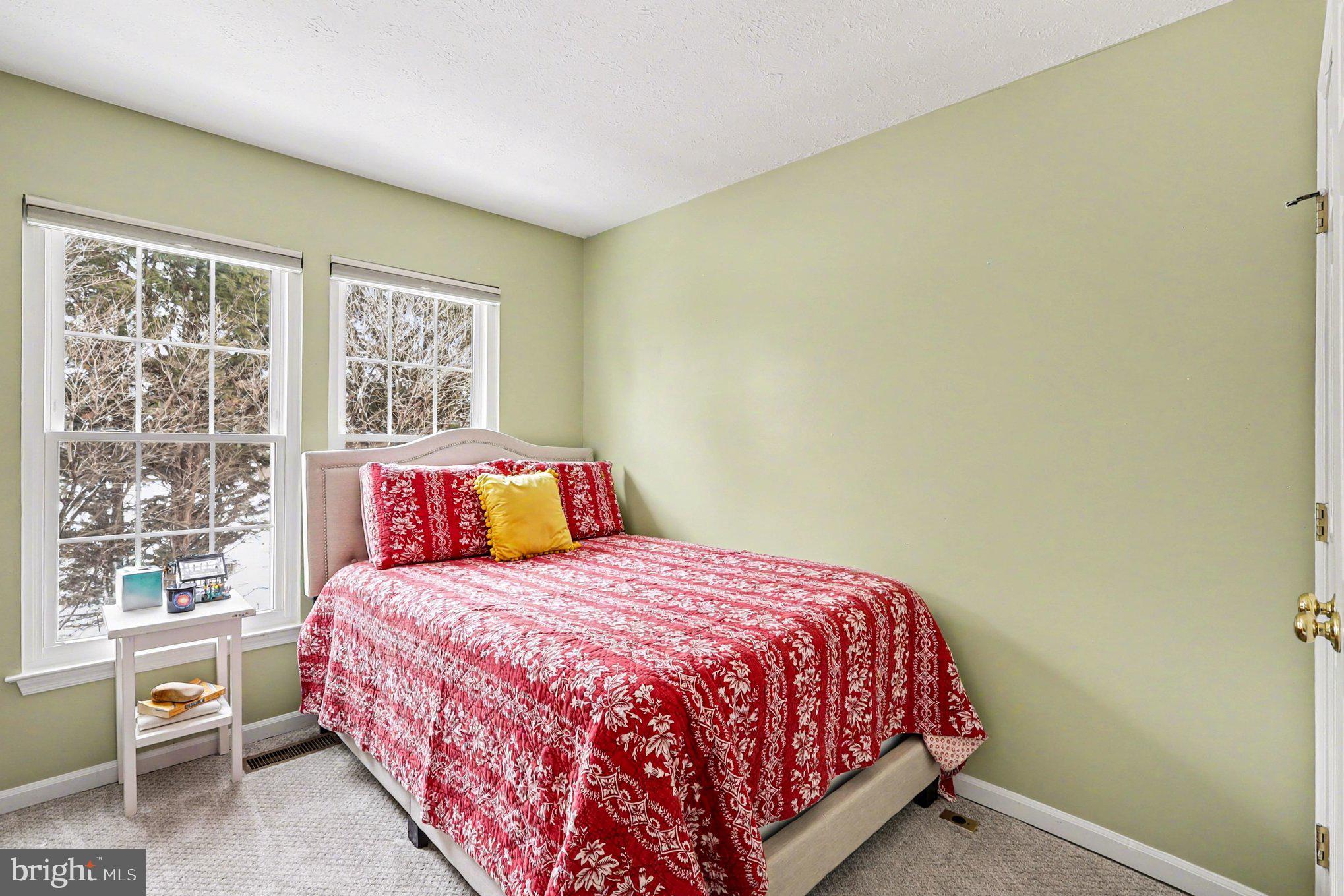 12607 Granite Ridge Drive North Potomac, MD 20878 - Photo 20 of 35 a bedroom with a bed and a window