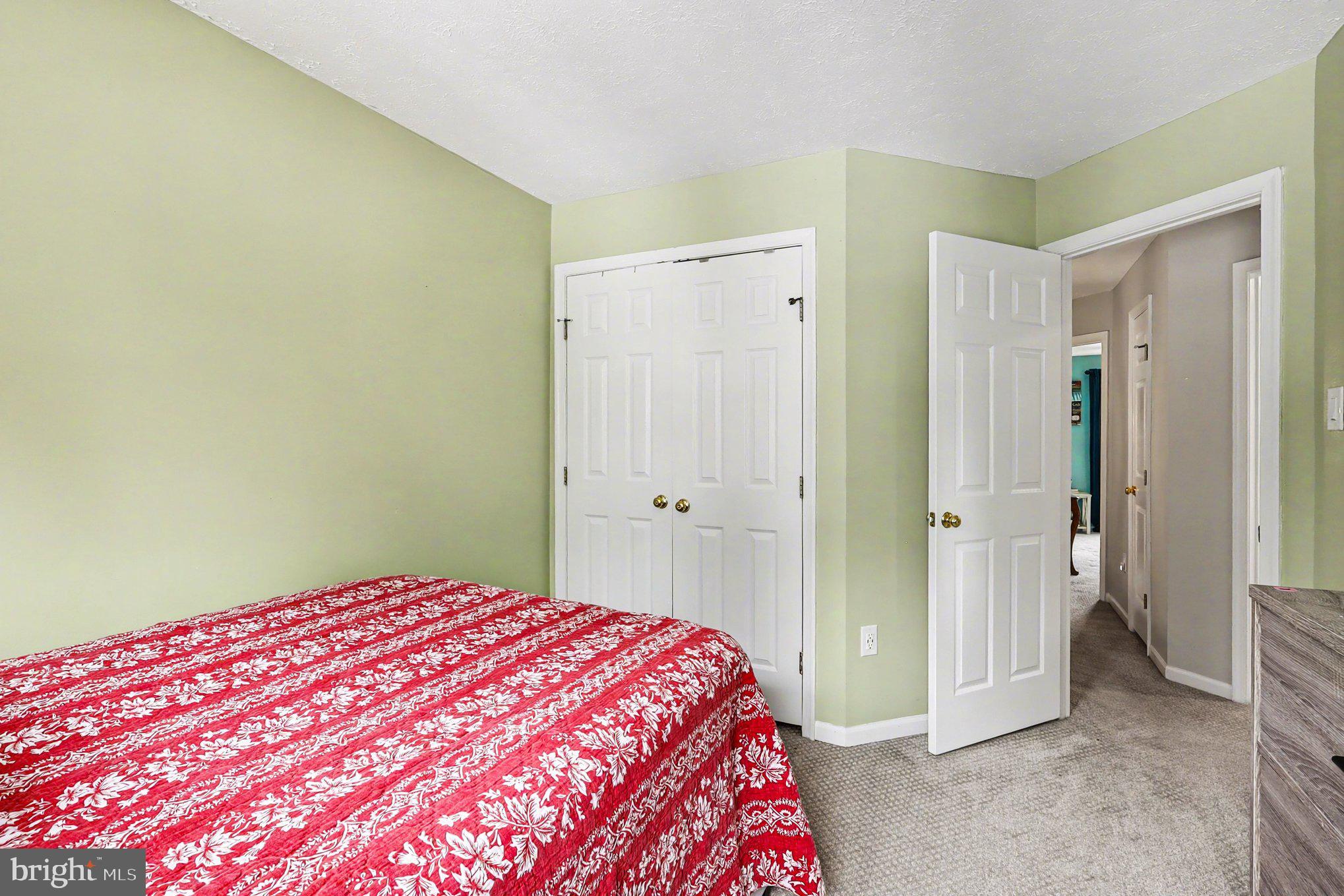 12607 Granite Ridge Drive North Potomac, MD 20878 - Photo 21 of 35 a bedroom with a bed and a shower