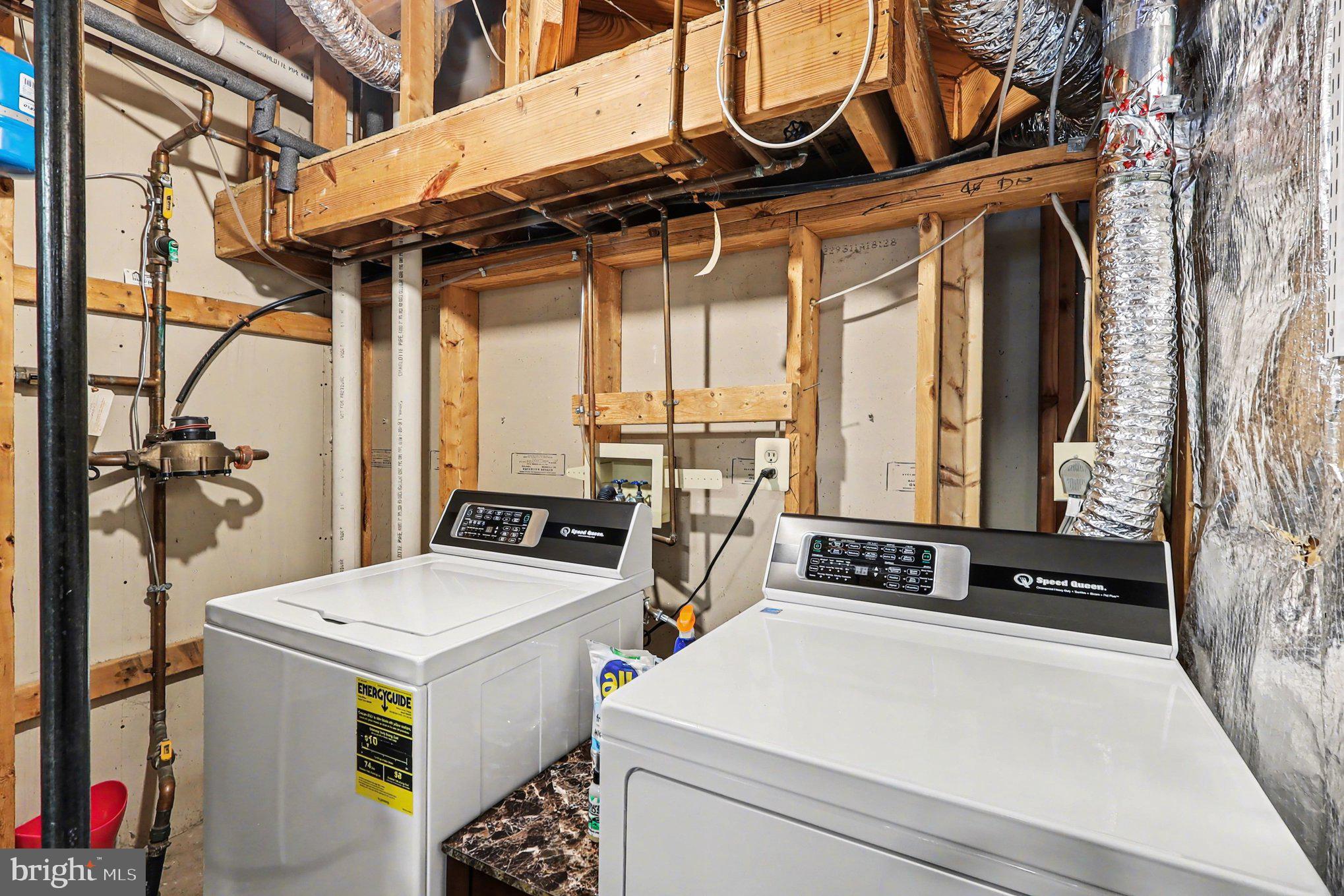 12607 Granite Ridge Drive North Potomac, MD 20878 - Photo 23 of 35 a utility room with dryer and washer