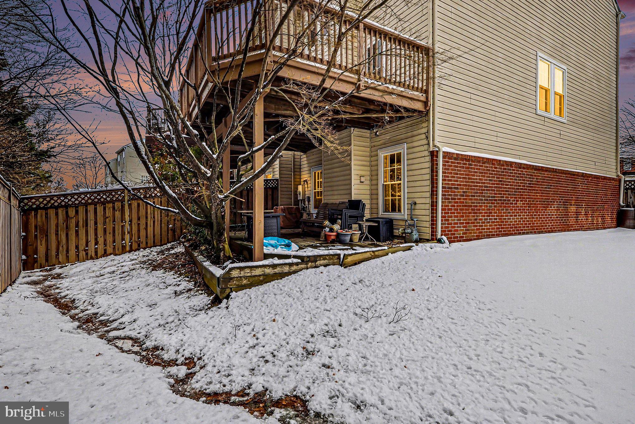 12607 Granite Ridge Drive North Potomac, MD 20878 - Photo 30 of 35 a view of a house with backyard and sitting area