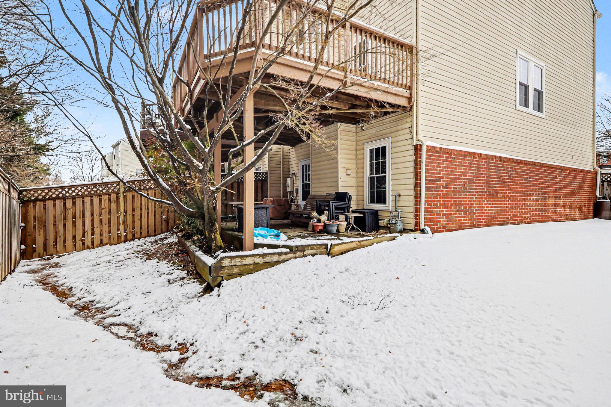 12607 Granite Ridge Drive North Potomac, MD 20878 - Photo 31 of 35 a view of a chairs and tables in the patio