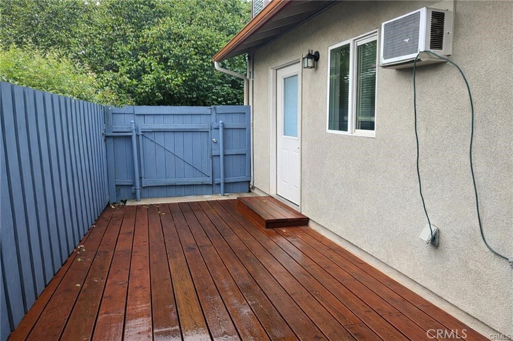 494 Alta Mesa Drive Riverside, CA 92507 - Photo 9 of 9 a view of a backyard with wooden floor and fence