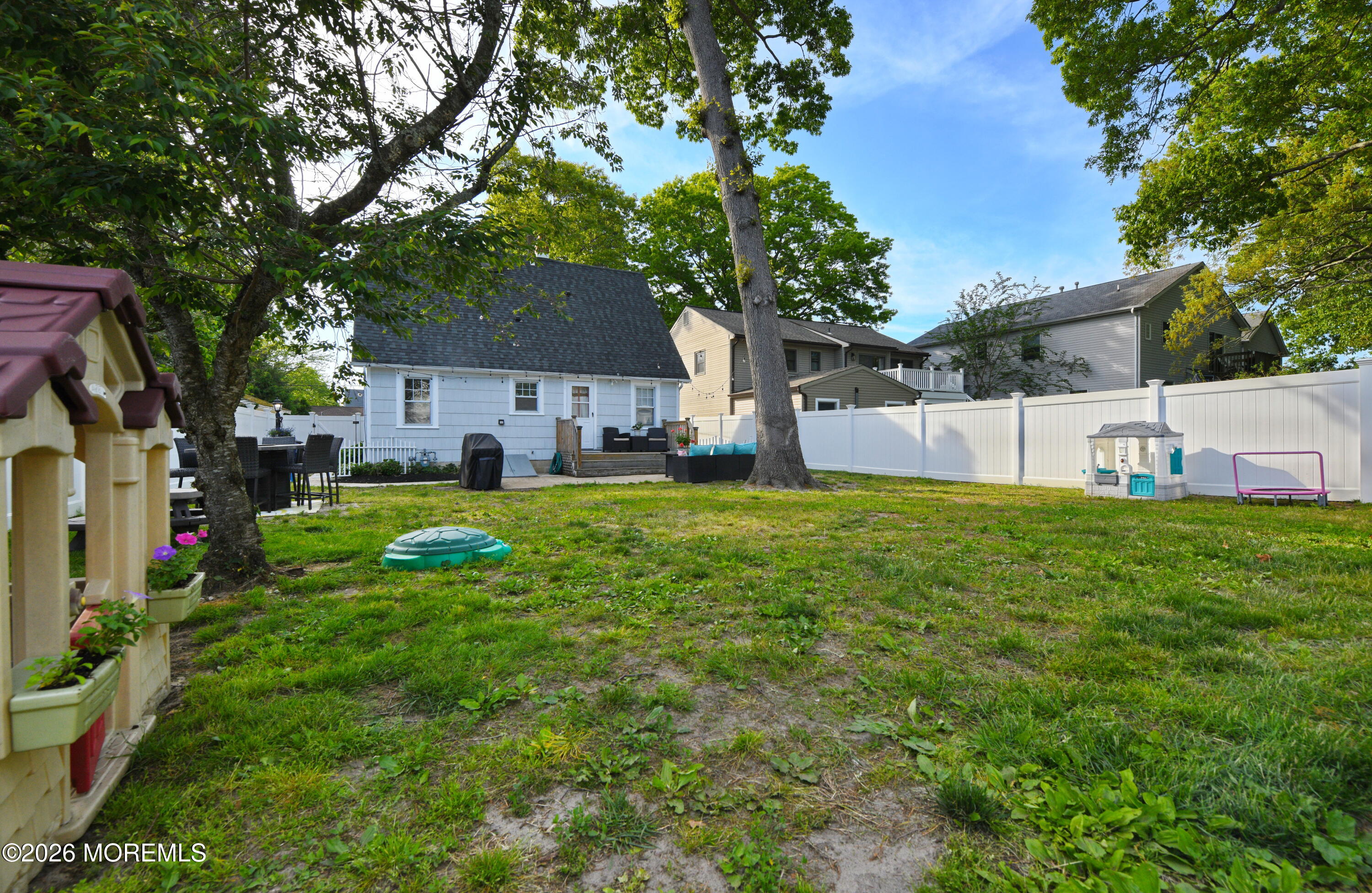 232 Pearce Avenue Point Pleasant, NJ 08742 - Photo 5 of 27 a view of a house with a back yard