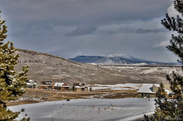 a view of a balcony with wooden floor