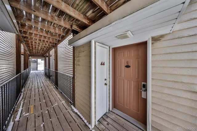 a view of a terrace with furniture and stove