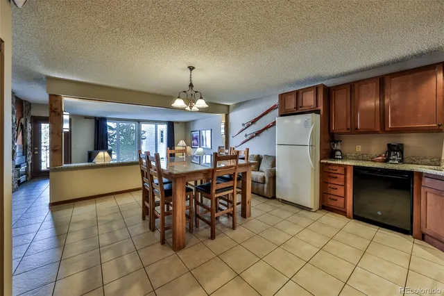 a view of a kitchen and dining room