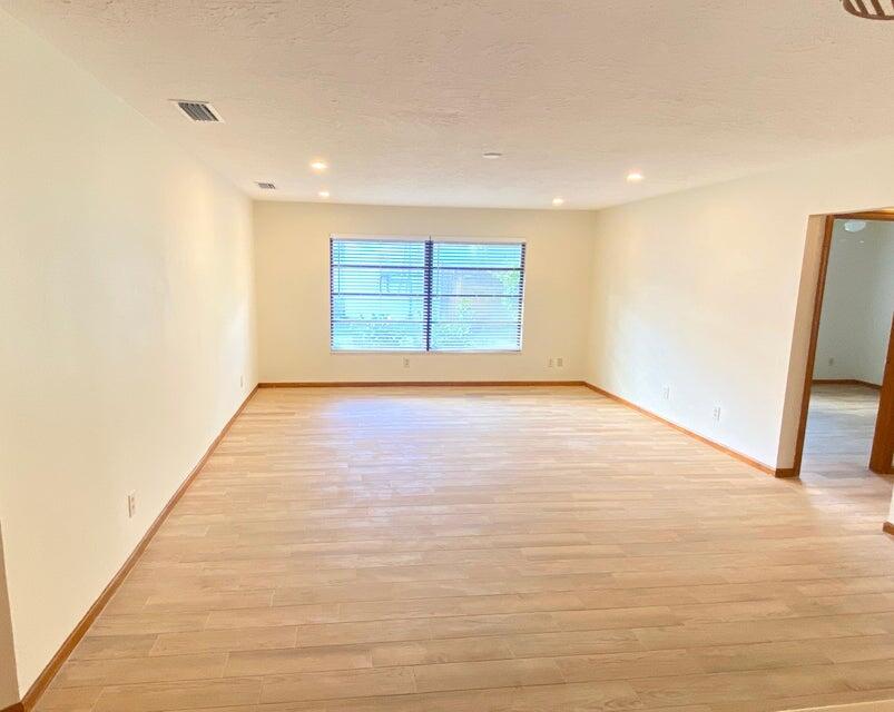 5585 Pennock Point Road Jupiter, FL 33458 - Photo 14 of 19 a view of an empty room with a window