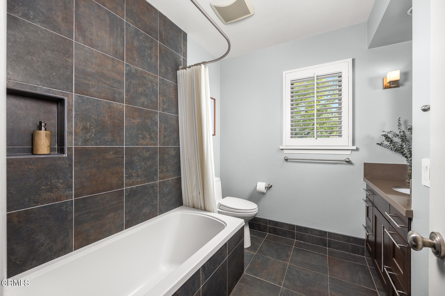 1961 Oak Street South Pasadena, CA 91030 - Photo 15 of 19 a bathroom with a tub a sink a window and a shower