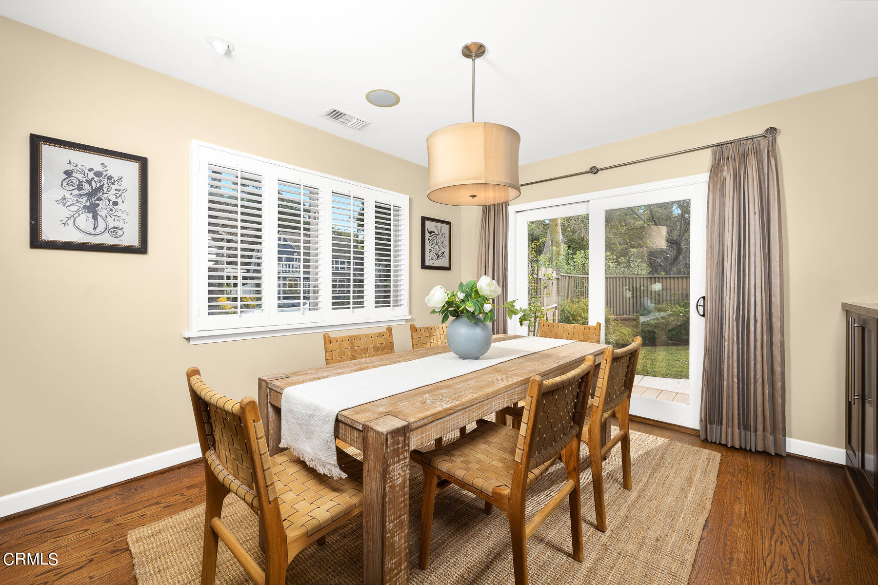 1961 Oak Street South Pasadena, CA 91030 - Photo 8 of 19 a dining room with furniture a chandelier and wooden floor
