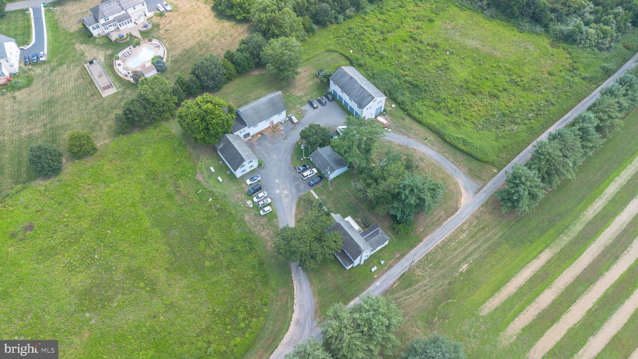 33 Allens Road Hightstown, NJ 08520 - Photo 9 of 12 Sprawling estate with lush greenery.