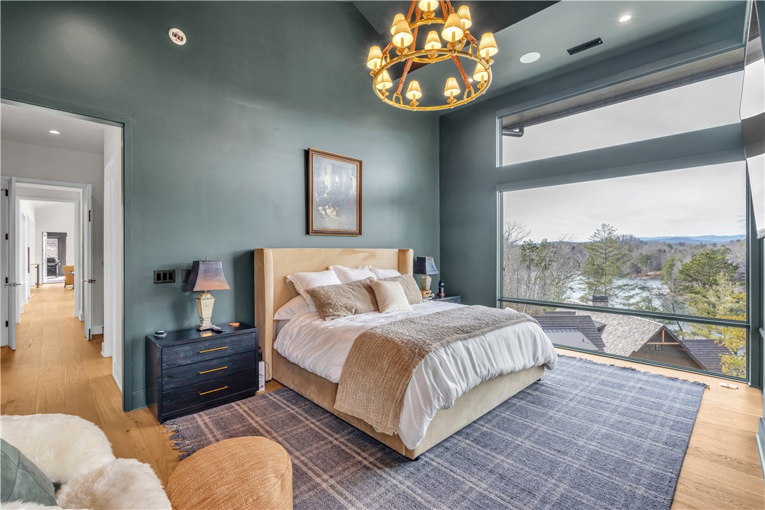 127 Crosswind Court Sunset, SC 29685 - Photo 16 of 49 This primary bedroom offers ample natural light and captivating views.