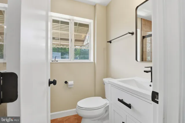 a view of a chairs and table in the patio
