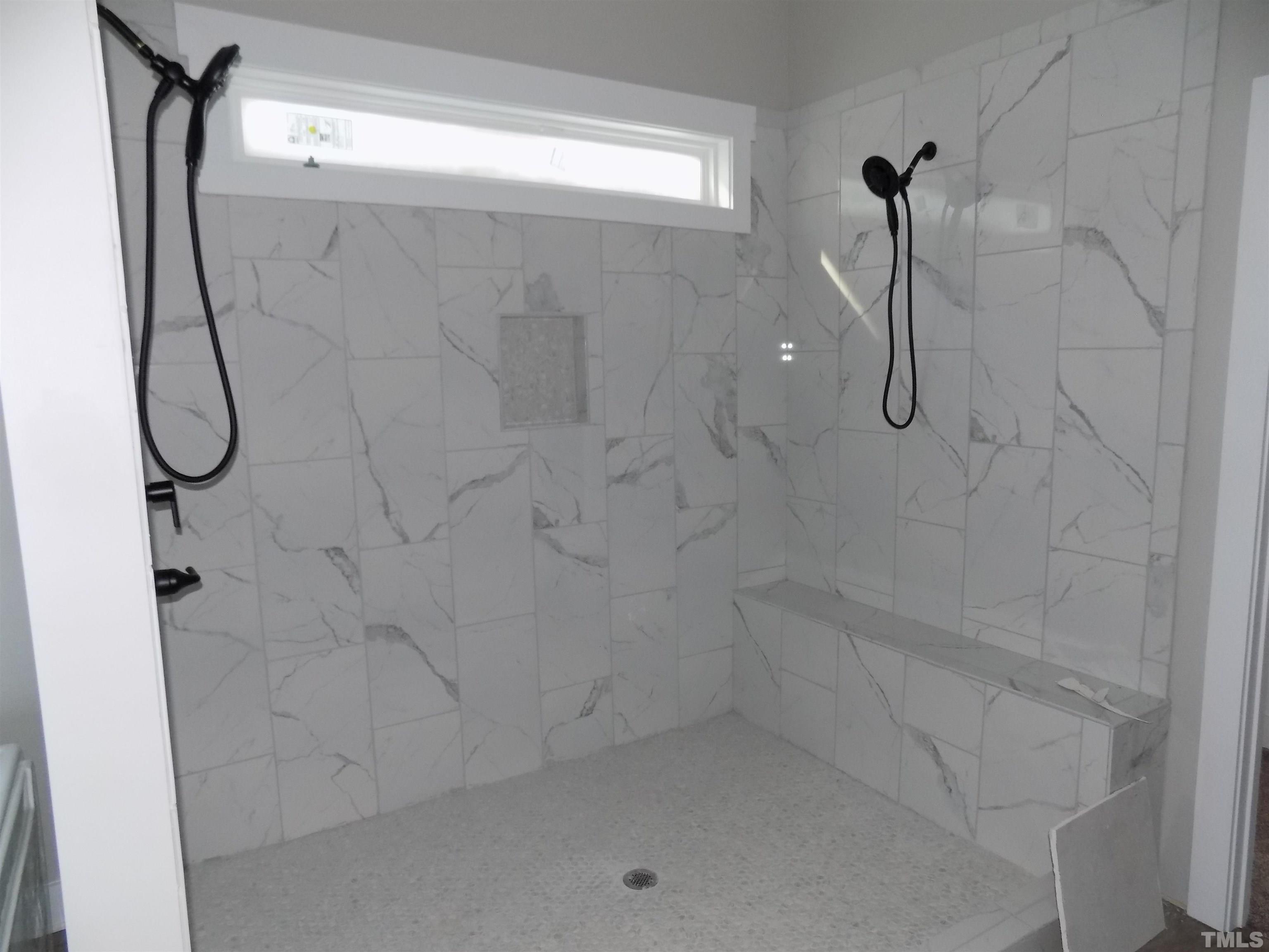 4561 Highway 56 Louisburg, NC 27549 - Photo 13 of 13 a bathroom with a shower