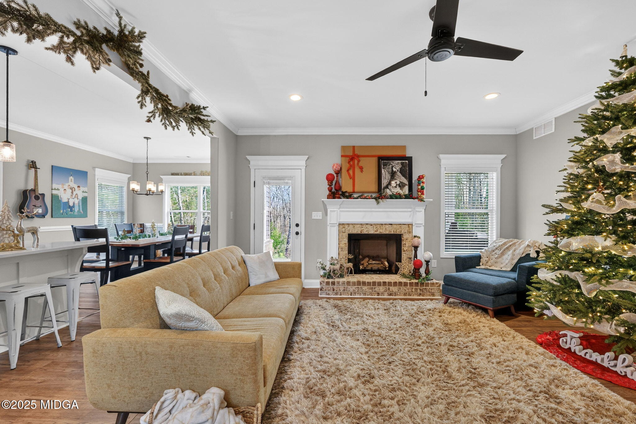 153 Jackson Drive Forsyth, GA 31029 - Photo 11 of 26 a living room with furniture and a fireplace
