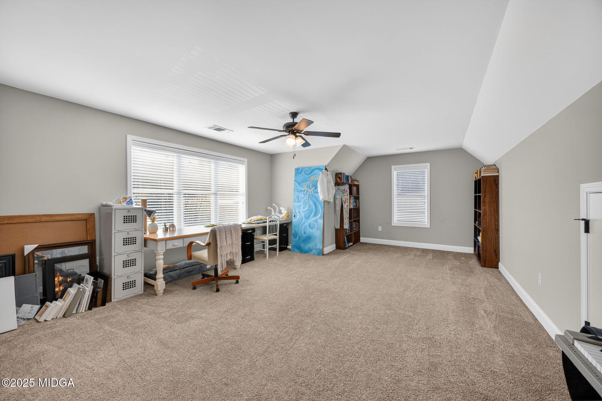 153 Jackson Drive Forsyth, GA 31029 - Photo 22 of 26 a view of a livingroom with workspace and a window