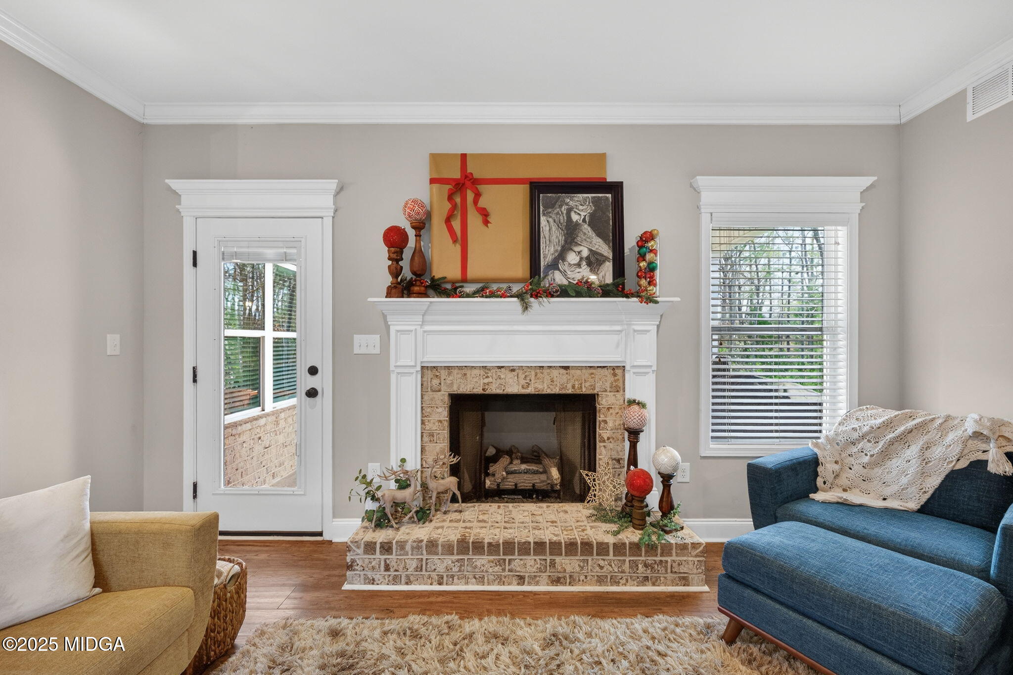 153 Jackson Drive Forsyth, GA 31029 - Photo 9 of 26 a living room with furniture and a fireplace
