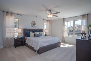 539 Wauka Drive Demorest, GA 30535 - Photo 12 of 19 a spacious bedroom with a large bed and a chandelier