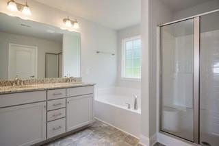 539 Wauka Drive Demorest, GA 30535 - Photo 15 of 19 a bathroom with a granite countertop sink mirror and a