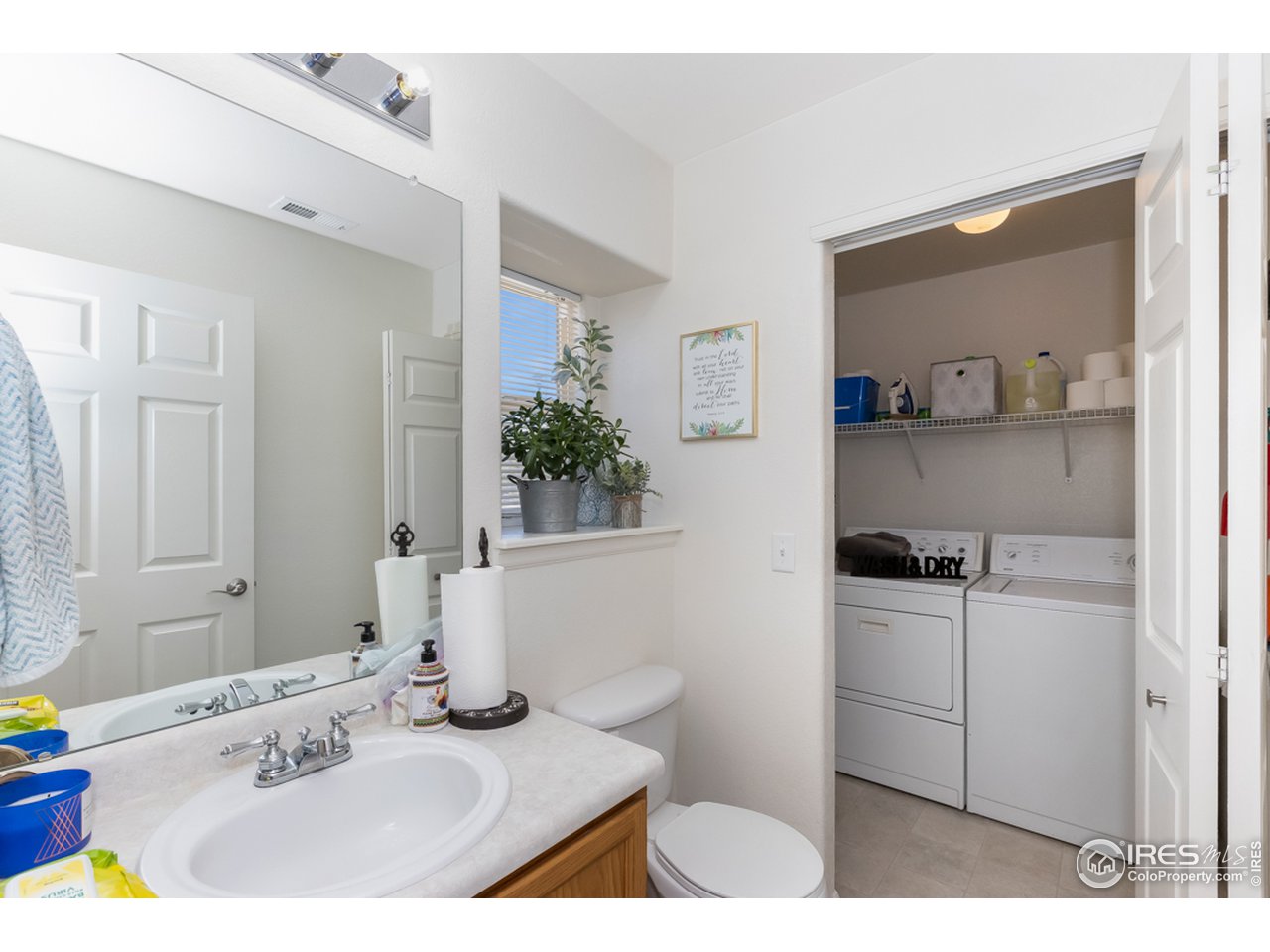 6827 Autumn Ridge Drive, Unit 3 Fort Collins, CO 80525 - Photo 12 of 35 Downstairs bathroom at front entrance of home.