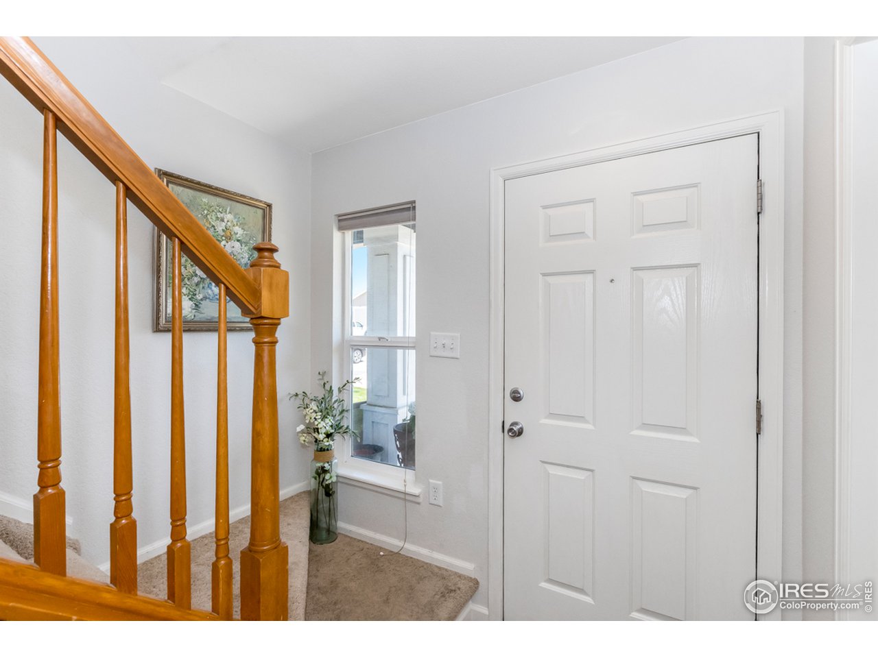 6827 Autumn Ridge Drive, Unit 3 Fort Collins, CO 80525 - Photo 14 of 35 Main foyer of home, go up to two master bed/baths.