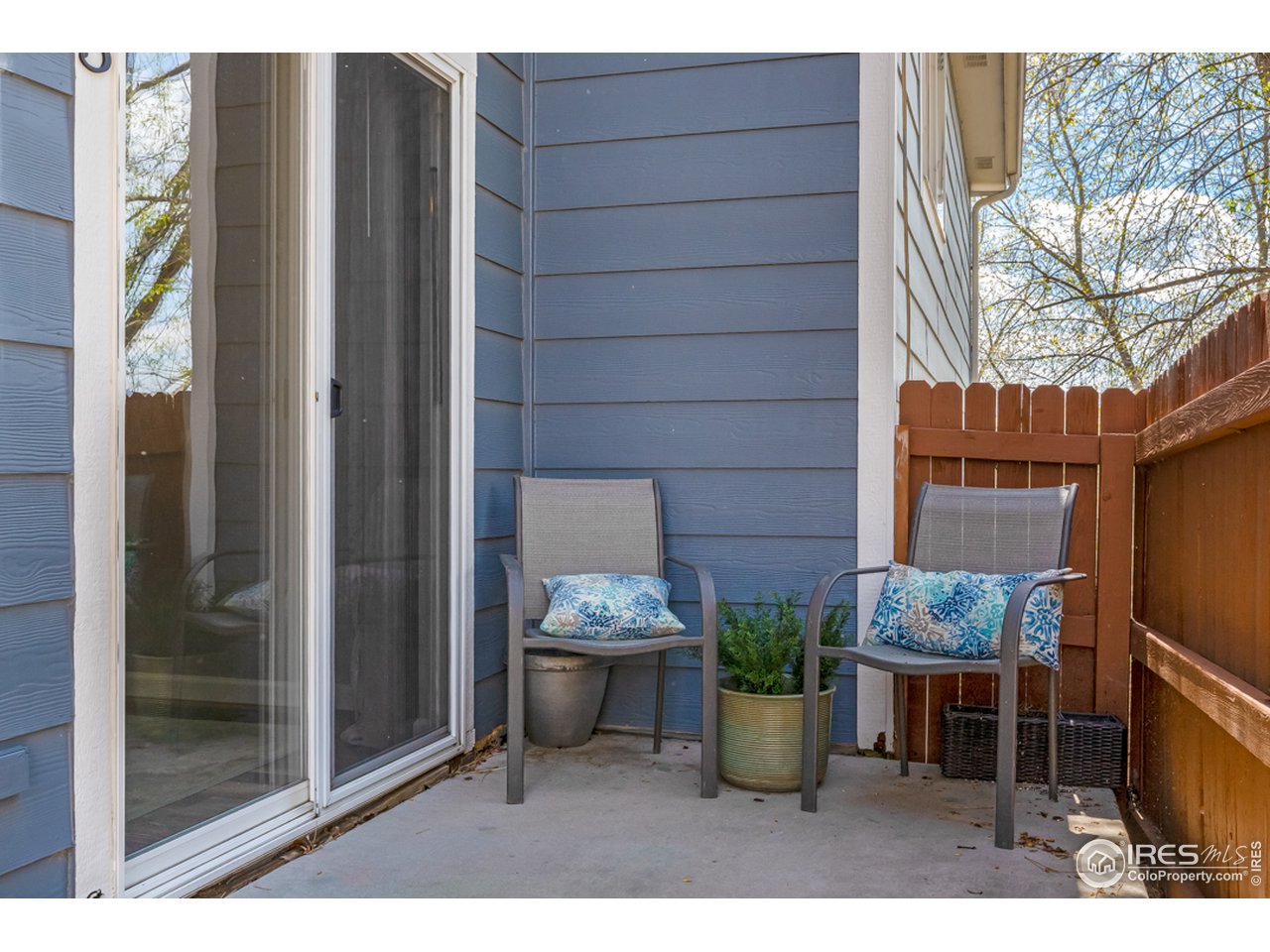 6827 Autumn Ridge Drive, Unit 3 Fort Collins, CO 80525 - Photo 33 of 35 Private back patio to breathe in some fresh air.