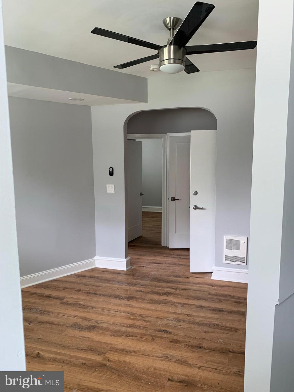 617-625 East Vernon Road, Unit 3A Philadelphia, PA 19119 - Photo 7 of 14 a view of a hallway with wooden floor