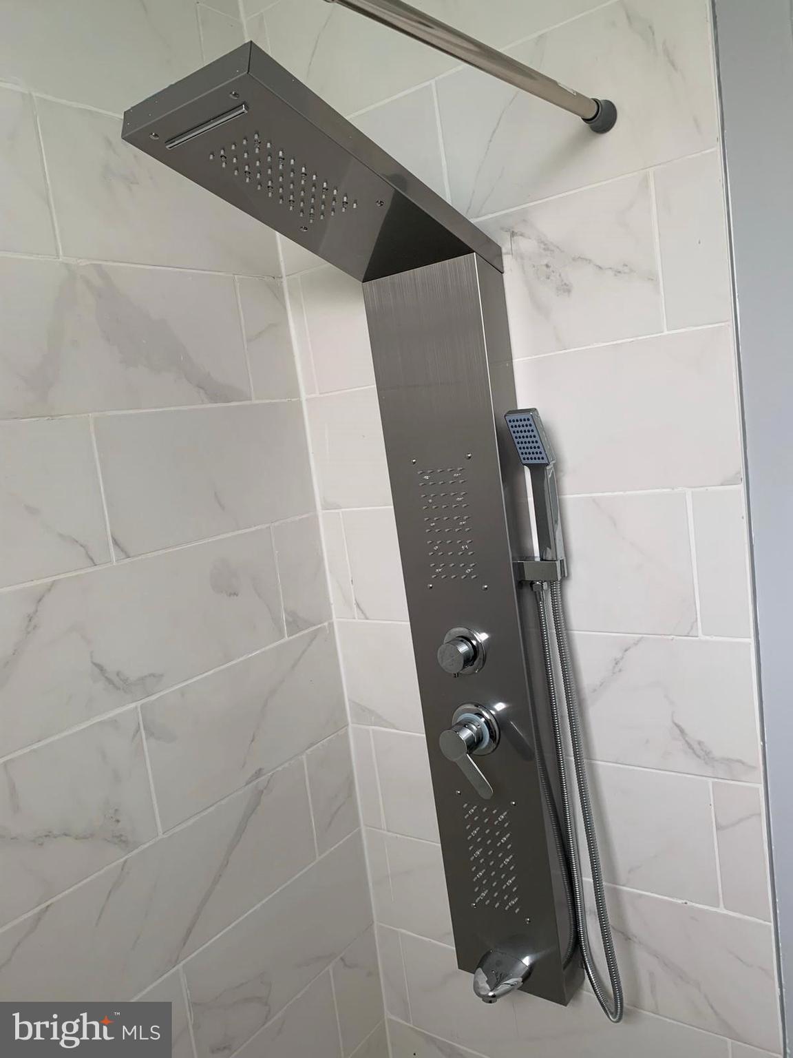 617-625 East Vernon Road, Unit 3A Philadelphia, PA 19119 - Photo 9 of 14 a bathroom with a shower
